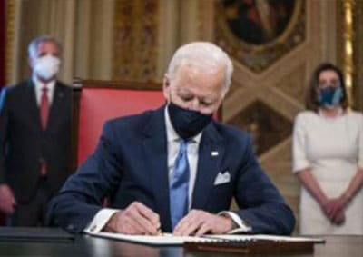 BIDEN REVERSES TRUMP BAN